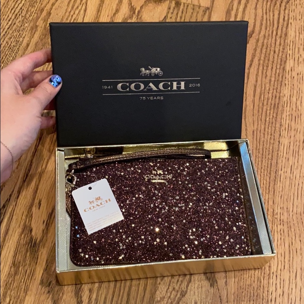Coach glitter star wristlet